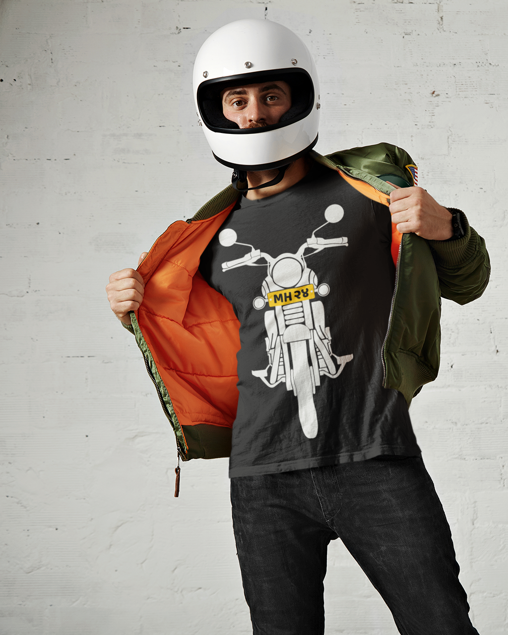 A man in a black t-shirt featuring a motorcycle graphic